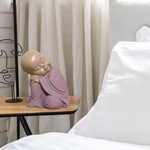 Statuette Bouddha Bébé Rose en Réflexion