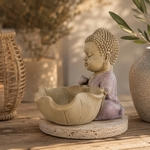 Statue Bouddha devant lotus