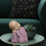 Statuette Bouddha Bébé Rose en Réflexion